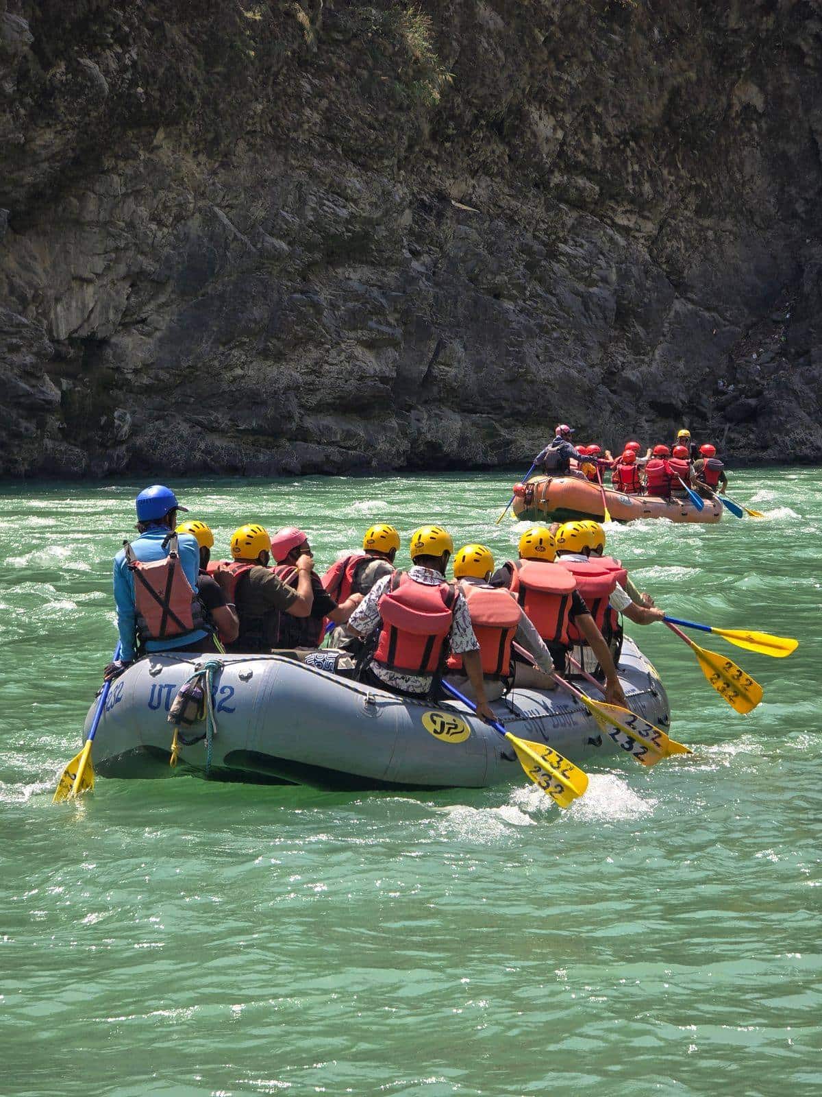 White-water rafts riding the rapids of the Ganga near Rishikesh